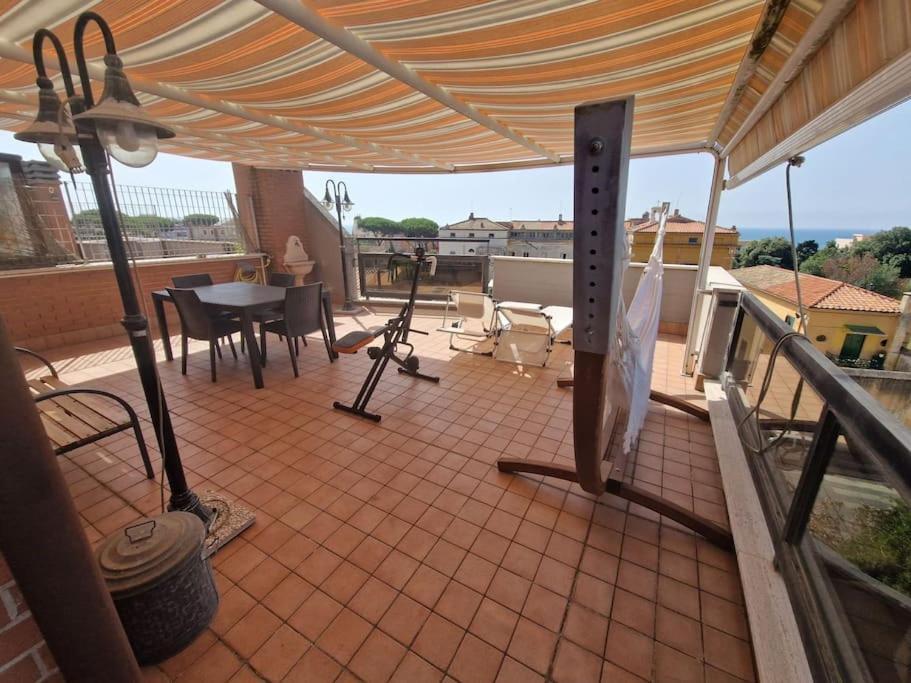 Terrazza A Nettuno E Chiesa Giubilare Santa Maria Goretti 外观 照片