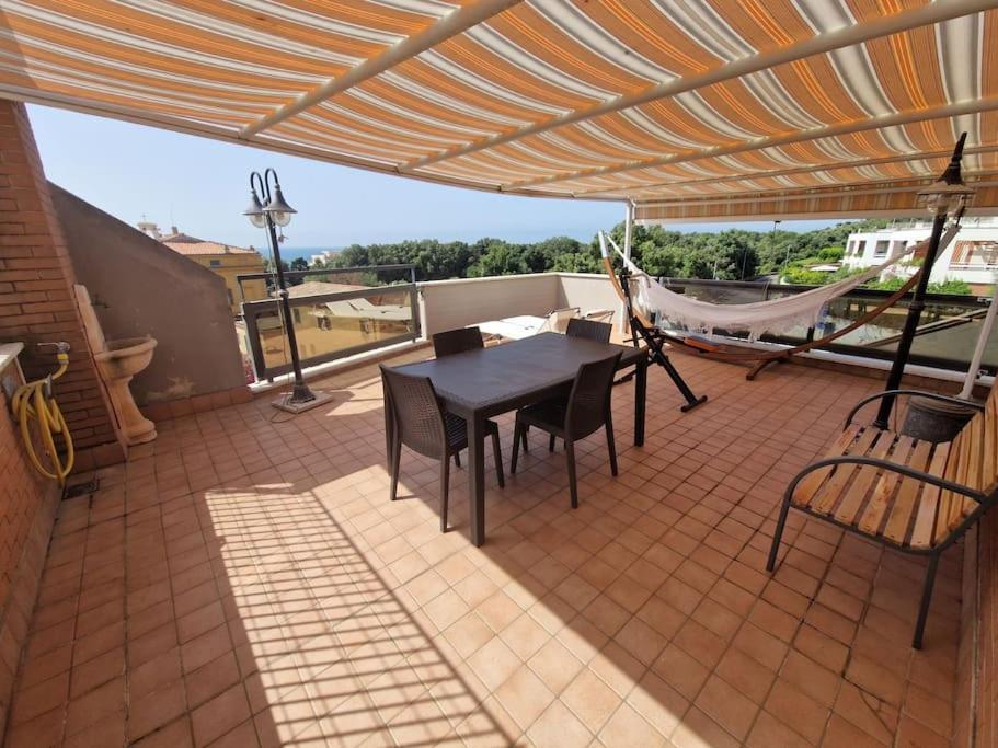 Terrazza A Nettuno E Chiesa Giubilare Santa Maria Goretti 外观 照片
